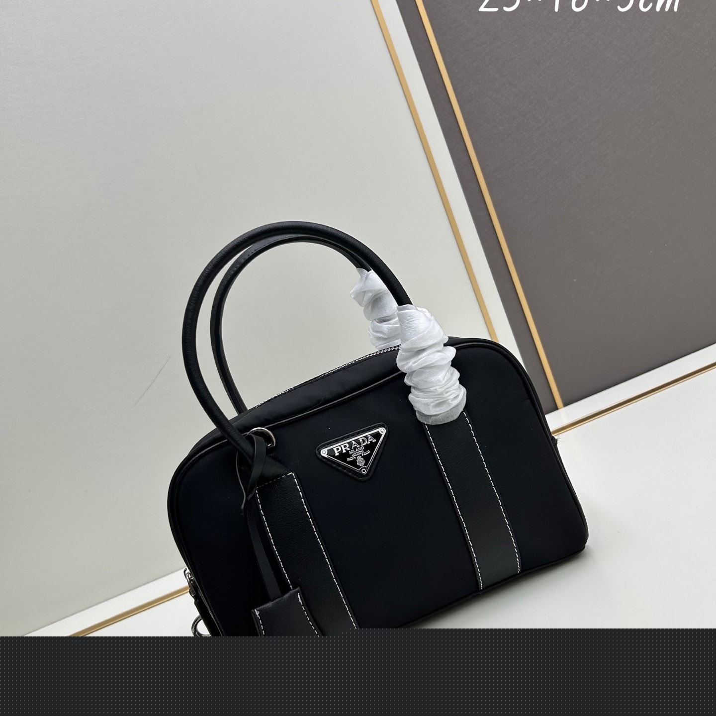 Pra*a top handle bags